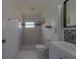 Nicely updated bathroom boasts a walk-in shower, new vanity, and sleek finishes at 2441 Persian Dr # 61, Clearwater, FL 33763