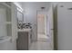Bathroom features updated vanity and lighting at 2441 Persian Dr # 61, Clearwater, FL 33763
