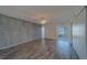Comfortable bedroom boasts sleek flooring, ample closet space, and a ceiling fan at 2441 Persian Dr # 61, Clearwater, FL 33763