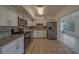 Modern kitchen with granite countertops and stainless steel appliances at 2441 Persian Dr # 61, Clearwater, FL 33763