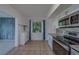 Modern kitchen with granite countertops and stainless steel appliances at 2441 Persian Dr # 61, Clearwater, FL 33763