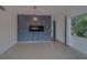 Bright living room features tiled floor, modern fireplace, and ample natural light at 2441 Persian Dr # 61, Clearwater, FL 33763