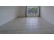 Bright living room with tile flooring and natural light at 2441 Persian Dr # 61, Clearwater, FL 33763
