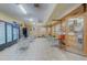 Community lounge area with snack machines, tables, and a charming library nook at 2441 Persian Dr # 61, Clearwater, FL 33763