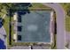 Aerial view of the community pickleball court with shade structures for players at 2441 Persian Dr # 61, Clearwater, FL 33763
