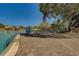 Inviting pool area with ample seating and a calming atmosphere for residents to enjoy at 2441 Persian Dr # 61, Clearwater, FL 33763
