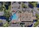 Aerial view of the large outdoor pool and surrounding parking and facilities at 2441 Persian Dr # 61, Clearwater, FL 33763