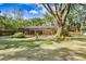 Spacious backyard offers lots of room to run and play at 2503 Victarra Cir, Lutz, FL 33559