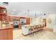 Spacious kitchen with long island, stainless appliances, and bar stool seating at 2503 Victarra Cir, Lutz, FL 33559