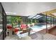 Covered patio offers access to pool and backyard at 2503 Victarra Cir, Lutz, FL 33559