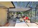 The back patio offers seating areas for lounging and dining, perfect for entertaining at 2503 Victarra Cir, Lutz, FL 33559