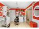 Interior view of a salon featuring two chairs and mirrors and storage shelving at 2503 Victarra Cir, Lutz, FL 33559