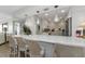 Bright kitchen with white cabinets, stone countertops and stainless-steel appliances at 2700 Bayshore Blvd # 11405, Dunedin, FL 34698