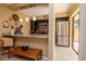 Modern kitchen with stainless steel appliances, granite countertops, and dark cabinets at 2725 11Th Ct, Palm Harbor, FL 34684