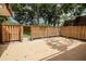 The back patio features a privacy fence and a small patch of grass at 2725 11Th Ct, Palm Harbor, FL 34684
