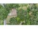 Aerial view of a home nestled among mature trees at 2911 Pemberton Creek Dr, Seffner, FL 33584