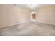 Spacious bedroom with carpet and an open doorway at 2911 Pemberton Creek Dr, Seffner, FL 33584