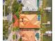 Aerial view from above of the house, pool and boat dock on the water at 301 Bayview Ne Dr, St Petersburg, FL 33704