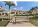 Waterfront home with a dock, lush greenery, and ample space for outdoor activities and relaxation at 301 Bayview Ne Dr, St Petersburg, FL 33704