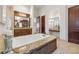 Lavish primary bathroom features a soaking tub with granite surround and dual vanities at 301 Bayview Ne Dr, St Petersburg, FL 33704