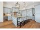 A gourmet kitchen features a large kitchen island with seating and stainless steel appliances at 301 Bayview Ne Dr, St Petersburg, FL 33704