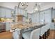A gourmet kitchen features a large kitchen island with seating, granite counters and stainless steel appliances at 301 Bayview Ne Dr, St Petersburg, FL 33704