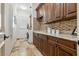 Convenient laundry room features ample cabinet space, granite countertops, and modern appliances for easy chores at 301 Bayview Ne Dr, St Petersburg, FL 33704
