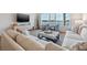 Bright living room with water views and stylish furnishings at 301 Bayview Ne Dr, St Petersburg, FL 33704