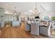 Open-concept living space with a modern kitchen, dining area, and a comfortable living room at 301 Bayview Ne Dr, St Petersburg, FL 33704