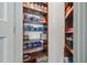 Walk-in pantry with ample shelving and storage at 301 Bayview Ne Dr, St Petersburg, FL 33704
