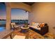 Inviting outdoor patio area with comfortable seating overlooking the water at 301 Bayview Ne Dr, St Petersburg, FL 33704