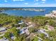 Beautiful aerial view of this home near a bay with blue water and lush landscaping at 310 55Th S Ave, St Petersburg, FL 33705