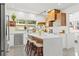 Stylish kitchen featuring a large island, stainless appliances, and ample counter space at 310 55Th S Ave, St Petersburg, FL 33705