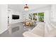 Cozy living room with modern furniture and a large window at 310 55Th S Ave, St Petersburg, FL 33705
