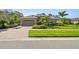 Charming single-story home featuring a brick driveway and well-manicured landscaping and lawn at 3402 Stonebridge Trl, Valrico, FL 33596