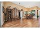 Open-concept living area with hardwood floors, accent walls, and stylish furniture, great for entertaining at 3402 Stonebridge Trl, Valrico, FL 33596