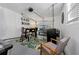 Finished garage converted into a game room with table, chairs and decor at 3485 Floral Dr, Largo, FL 33771
