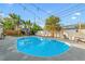 Large backyard with new pool, lounge chairs, and playset at 3485 Floral Dr, Largo, FL 33771