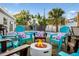 Entertainer's backyard with custom fire pit and inground pool at 3485 Floral Dr, Largo, FL 33771