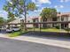 Condos with covered parking and manicured landscaping at 3505 Tarpon Woods Blvd # P404, Palm Harbor, FL 34685