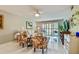 Comfortable living room with sliding glass doors and neutral color palette at 3505 Tarpon Woods Blvd # P404, Palm Harbor, FL 34685