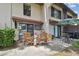 Enjoy the outdoors in this condo's patio with table, chairs, and outdoor decor at 3505 Tarpon Woods Blvd # P404, Palm Harbor, FL 34685