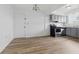 Updated kitchen features stainless steel appliances and modern gray cabinets at 3580 38Th S Ave # 95, St Petersburg, FL 33711