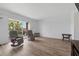 Bright living area features new floors and balcony access at 3580 38Th S Ave # 95, St Petersburg, FL 33711
