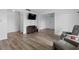 Spacious living area with light flooring and fireplace at 3580 38Th S Ave # 95, St Petersburg, FL 33711