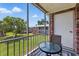 Screened patio with a table and chair set, with exterior door access to the community green space at 3580 38Th S Ave # 95, St Petersburg, FL 33711