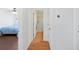 Hallway that leads to the bedroom at 37420 Teaberry Loop, Zephyrhills, FL 33542