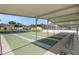Covered shuffleboard courts offer a fun and engaging outdoor activity for residents at 37420 Teaberry Loop, Zephyrhills, FL 33542