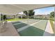 Enjoy outdoor recreation on the covered shuffleboard courts, perfect for active community living at 37420 Teaberry Loop, Zephyrhills, FL 33542