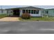 Charming single-story home with carport and well-maintained lawn at 37832 Madeira Ave, Zephyrhills, FL 33541